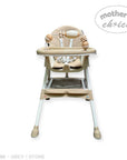 Beige and white high chair with 'Mother's Choice' branding on a white background