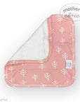 Pink baby bib with white tree pattern on a white background, featuring 'Mother's Choice' branding.