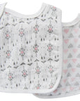 Two baby bibs with geometric patterns on a white background