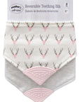 Reversible teething bib with deer antler and pink heart pattern on a white background