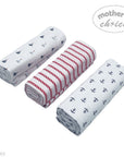 Three rolls of fabric with different patterns on a white background, featuring the brand 'Mother's Choice'.