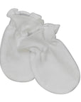 White ceramic heart-shaped object on a white background