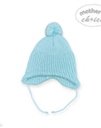 Light blue knitted baby hat with a pom-pom on a white background, featuring 'Mother's Choice' branding.
