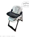 Baby high chair with tray on a white background, branded 'Mother's Choice'.