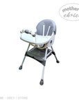 Gray and white high chair with 'Mother's Choice' branding on a white background