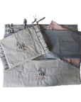 Set of gray baby blankets with zebra design on a white background