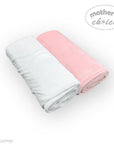 Pink and gray baby blanket with 'Mother's Choice' branding on a white background