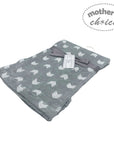 Gray baby blanket with white patterns and a tag, branded 'Mother's Choice', on a white background.