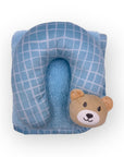 Blue checkered neck pillow with a teddy bear face on a white background