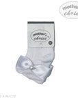 White baby socks with a bow and pearl detail on a white background, branded 'mother's choice'.