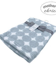 Folded blanket with gray and white pattern on a white background, featuring 'mother's choice' branding.