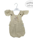 Beige baby romper with ruffled sleeves on a white background, featuring 'mother's choice' branding.