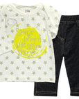 Children's outfit with star-patterned shirt and dark jeans on a white background