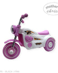 Black and pink toy tricycles with 'Mother's Choice' label on a white background