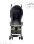 Black and gray stroller with 'Mother's Choice' branding on a white background