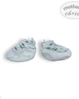 Pair of baby booties with leaf pattern on a white background, branded 'Mother's Choice'.
