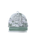 Baby hat and bib set with floral pattern on a white background