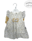 Baby dress with floral pattern and bow on a hanger against a white background, featuring 'mother's choice' branding.