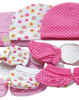 Set of baby hats and booties with floral and polka dot patterns on a white background