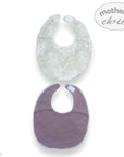Two baby bibs, one white with a textured pattern and one purple, on a white background with 'mother's choice' branding.