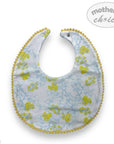 Baby bib with floral pattern and yellow trim on a white background, branded 'mother's choice'.