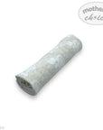 Rolled-up fabric with floral pattern on a white background, featuring 'mother's choice' branding.