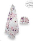 Baby swaddle and hat set with floral pattern on a white background, featuring 'mother's choice' branding.