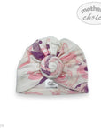 Baby turban with floral pattern on a white background, featuring 'mother's choice' branding.