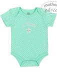 Mint green baby onesie with white polka dots and 'So Blessed' text on a white background.