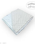 Two baby blankets, one light blue and one gray with a textured surface, on a white background. Brand 'Mother's Choice' visible.