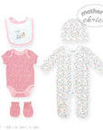 Baby clothing set with onesie, romper, bib, and hat on a white background