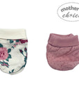Two baby bloomers, one floral and one pink with white polka dots, on a white background with 'Mother's Choice' branding.