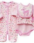 Baby clothing set with onesie, bib, and booties on a white background