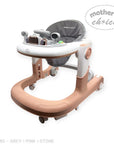 Baby walker with pink and stone design on a white background, featuring 'Mother's Choice' branding.
