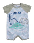 Baby romper with dinosaur design and 'DINO-MITE' text on a blue sky background