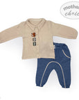 Children's beige shirt and blue pants set with 'Mother's Choice' branding on a white background.
