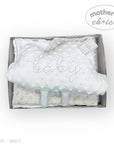 Baby blanket with 'baby' embroidery in a box labeled 'Mother's Choice' on a white background.