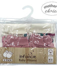 Packaged baby mittens with 'infancie' branding on a white background