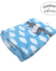 Blue and white cloud-patterned blanket with a gray ribbon and tag on a white background, branded 'Mother's Choice'.