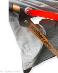 Close-up of a baby stroller with 'mother's choice' branding on a white background