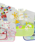 Set of colorful baby bibs with various designs on a white background