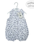 Baby romper with floral pattern on a hanger with 'mother's choice' tag