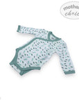 Baby long-sleeve bodysuit with floral pattern on a white background, featuring 'Mother's Choice' branding.