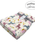 Floral-patterned blanket with a 'Mother's Choice' label on a white background