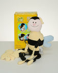 Stork And Baby Mothers Choice 2-in-1 Bee Harness, a plush bumblebee with black stripes and blue wings, featuring adjustable straps and a detachable rein.