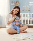 Mother's Choice 5 piece starter pack in blue with a dinosaur print, made of 100% cotton. Includes a onesie and hat.