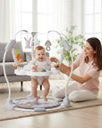 Stork And Baby astronaut themed baby jumper with 360-degree spinning seat and hanging toys for 6-18 month olds