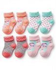 Stork And Baby 4 pack baby socks with owl print, polka dots, and stripes in coral, mint, grey, and pink.