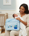 Stork And Baby blue daypack with elephant and shower graphic, perfect for baby essentials.