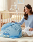 Stork And Baby light blue round top nappy bag with a car applique and "cute as a button" text.